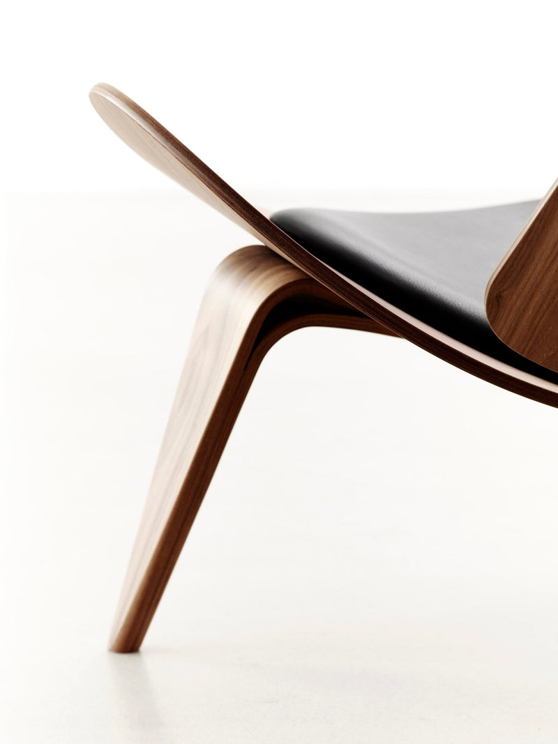 Retro wood and leather shell chair